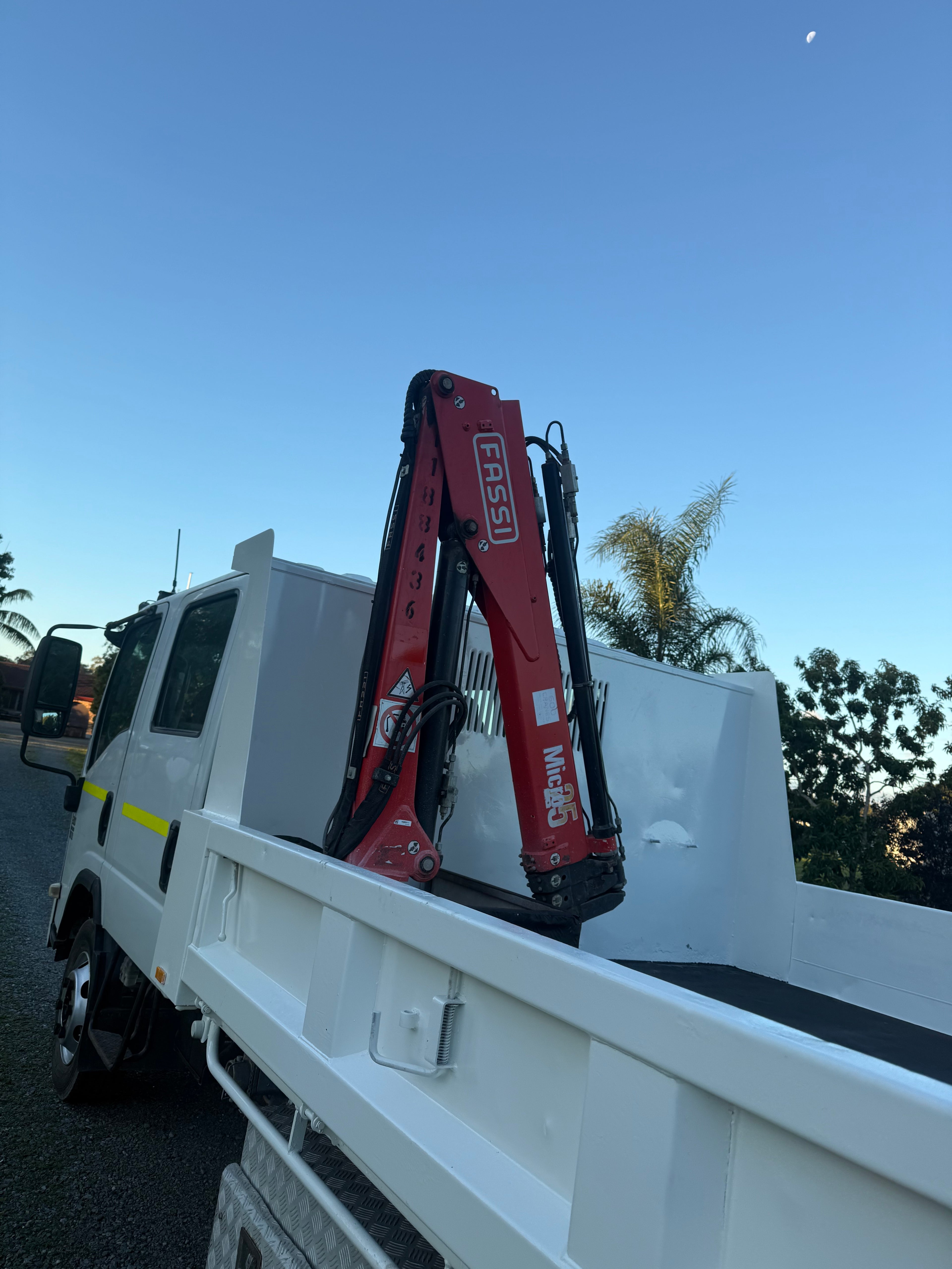 NPR 300 dual cab tipper with HIAB